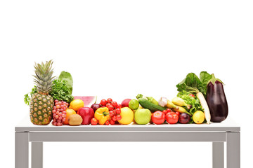 A studio shot of pile of fruits on a table