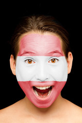 girl with austrian flag painted on her face
