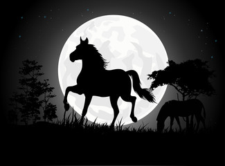 Beautiful Horse silhouettes with giant moon background