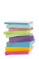 a pile of colorful adhesive paper