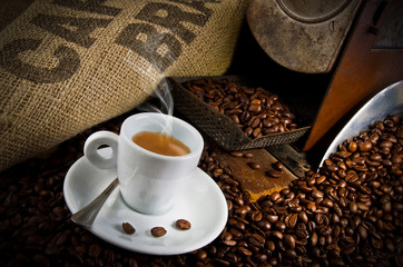 Coffee smoking on the coffee beans background