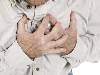 old man holding his chest