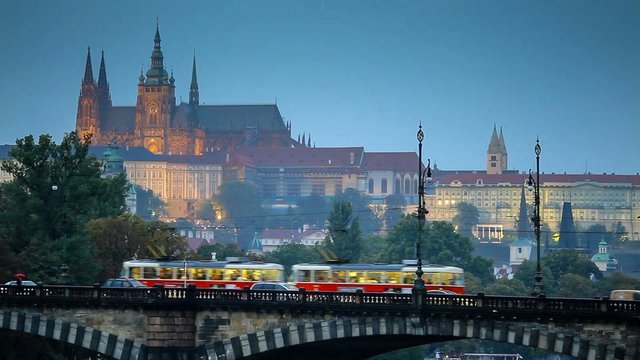 Tram passes over the bridge in Prague