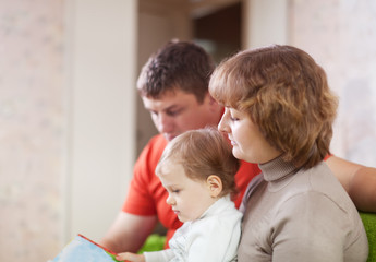 parents with child  in home interior