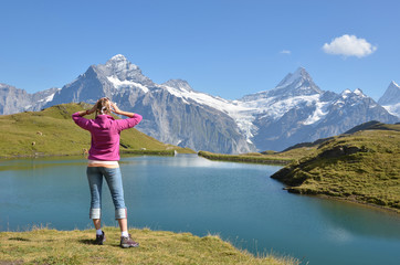 Traveler against Swiss Alps