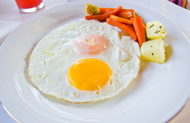 Egg fry with vegetable.
