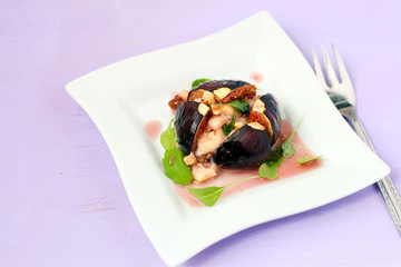 Figs baked with goat cheese, nuts and honey
