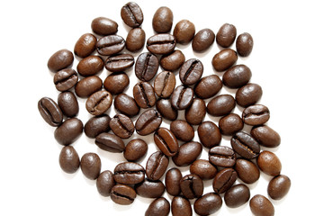 Coffee grains on white