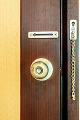 Obraz premium Door knob on wood door background