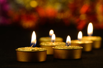Golden burning candles