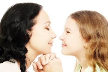 Child girl with mother playing