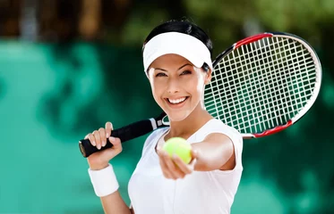 Foto auf Acrylglas Woman in sportswear serves tennis ball. Tournament © Karramba Production