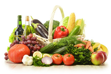 Fototapeta na wymiar Fruits and vegetables in wicker basket