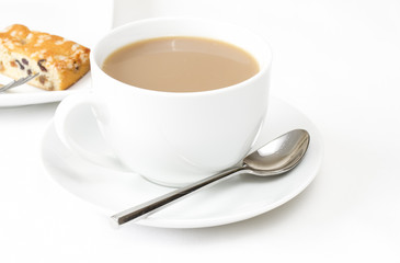 Cup of tea with a slice of fruit cake