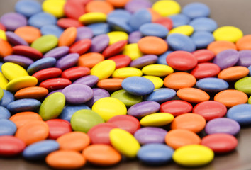 Fototapeta na wymiar multicolored chocolate candies