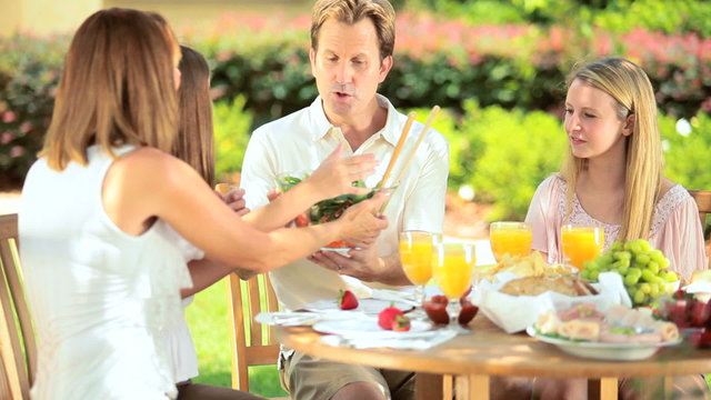 Family eating sensible healthy meal 