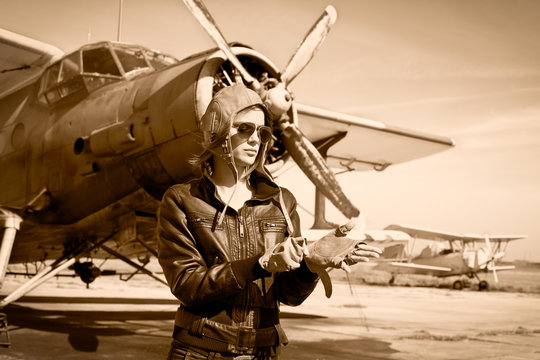 Portrait of beautiful female pilot