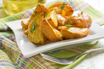 Rustic oven baked potatoes with parsley