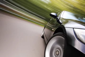 Fototapete Schnelle Autos Sportwagen im schnellen Antrieb