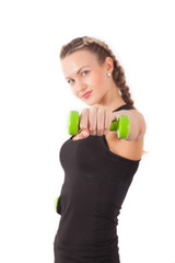 Fototapeta na wymiar Athletic young woman with dumbbell