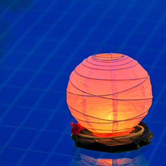 Floating water lantern in the pool