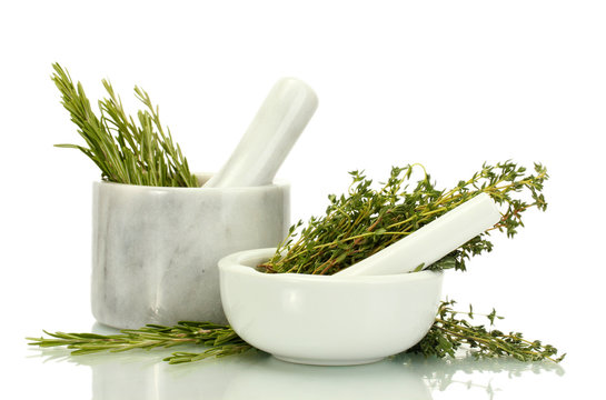 Mortars With Fresh Green Thyme And Rosemary Isolated On White