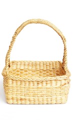 sedge basket for fruit isolated on white