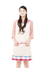 Fototapeta premium Beautiful young woman wearing an apron. Portrait of asian.