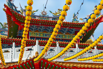 Yellow Lanterns Hanging on Temple Roof