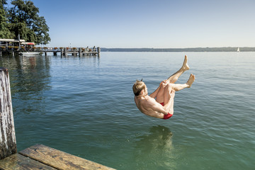 jumping into the water
