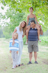 Obraz premium Happy Three Generations Family Outdoor