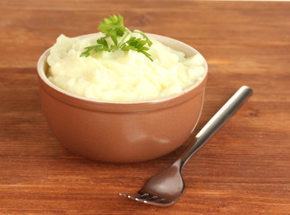 Mashed potato with parsley in the bowl