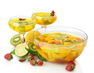 punch in bowl and glasses with fruits, isolated on white