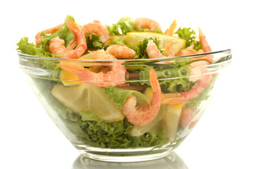 salad with shrimps, lemon and lettuce leaves in bowl, isolated