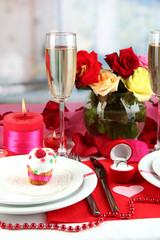Table setting in honor of Valentine's Day on room background