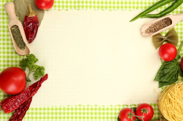 paper for recipes,vegetables and spices on green background