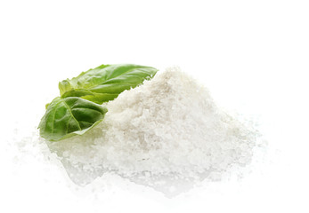 salt with fresh basil isolated on white