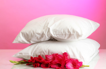 pillows and flower, on pink background