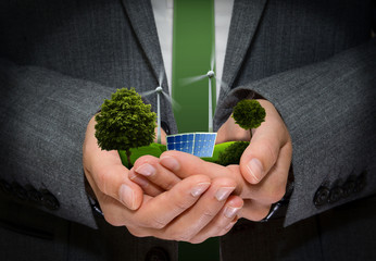 Hands hold Green Energy