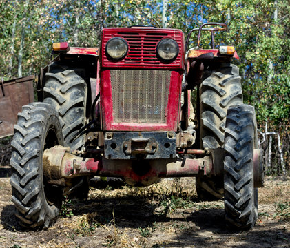 front of a farm tractor