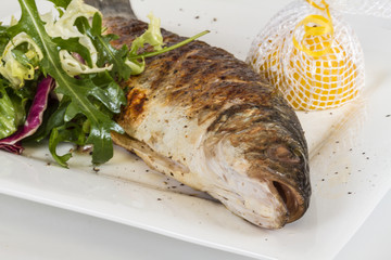 Sea-bass with vegetables