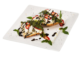 Fresh toast sandwiches with cheese and basilic and pesto.