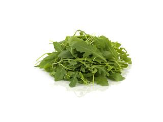 rucola on white table