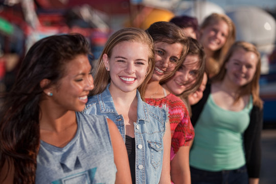 Smiling Teen Girls in Line