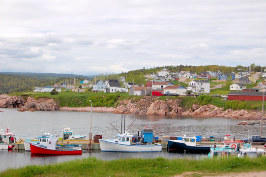 Fototapeta Colourful Fishing Boats in Cape Breton