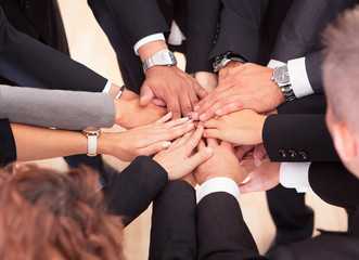 Business People With Their Hands Together