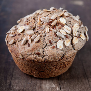 Close-up of  blueberry muffin topped with oats and almonds