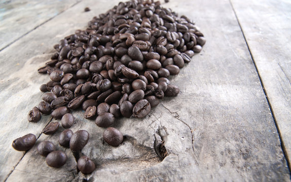 coffee beans on old wooden table