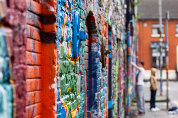 Graffiti wall with painters
