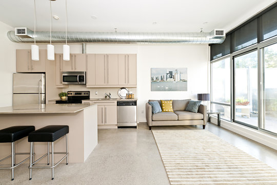 Modern condo kitchen and living room